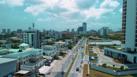 victoria island lagos, nigeria - 24 june 2021: drone view of major roads and traffic in victoria island lagos showing the cityscape, offices and residential buildings.