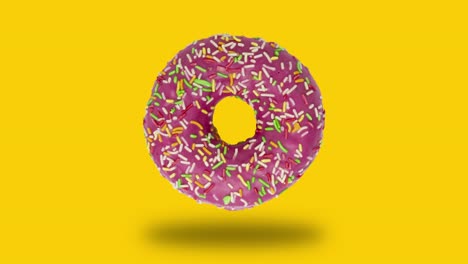 el donut rosado gira sobre un fondo naranja. gráficos de movimiento simples animación de comida
