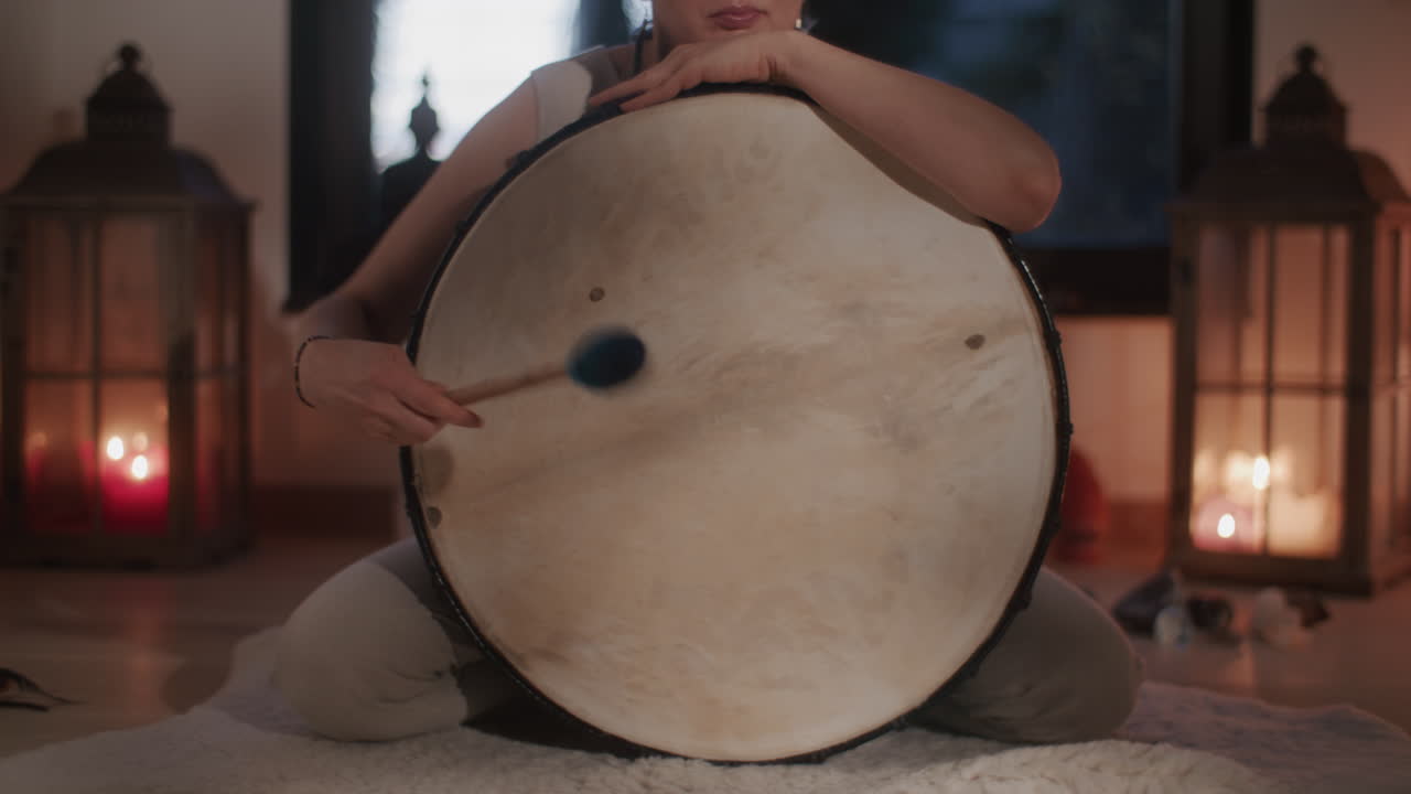 Woman Playing Bodhran Drum