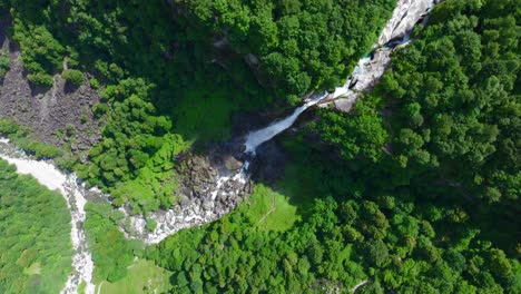 overhead view of foroglio waterfall with green forest in ticino, switzerland