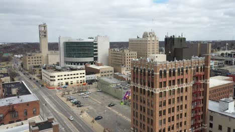 downtown pontiac, michigan skyline with drone video moving sideways close up