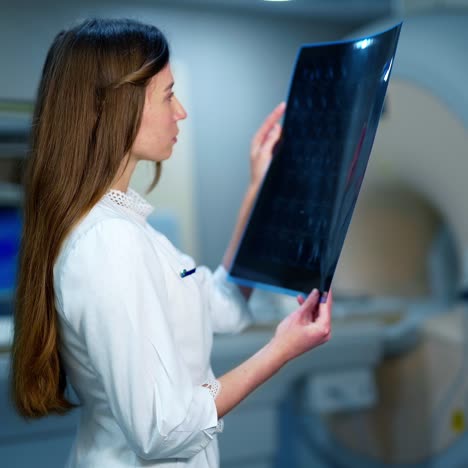 doctor examining mri picture