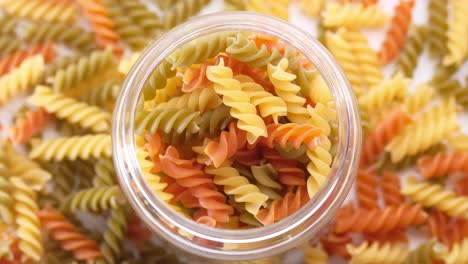 colorful spiral pasta in a jar