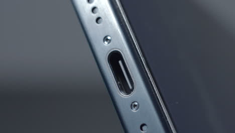 closeup of a black smartphone port