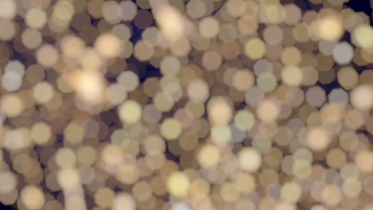 Twinkling Bokeh Gold Lights Blue Background Glitter Effect Loop