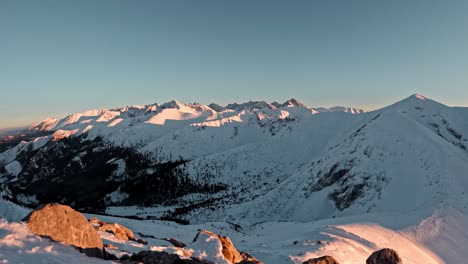 4k timelapse of winter sunset lights and moving shadows in high mountains