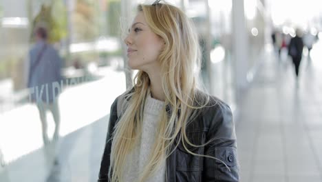 Woman-looking-at-shop-window