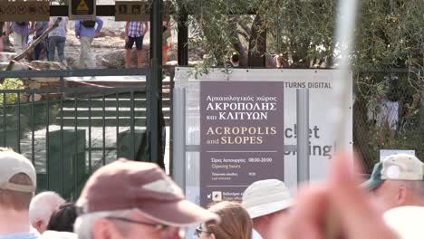 tourists at acropolis entrance