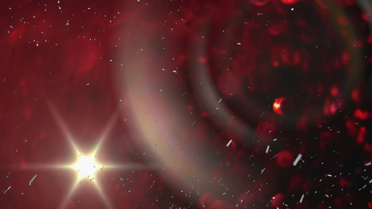 검은 바탕에 있는 빛의 반점과 빛의 흔적의 애니메이션