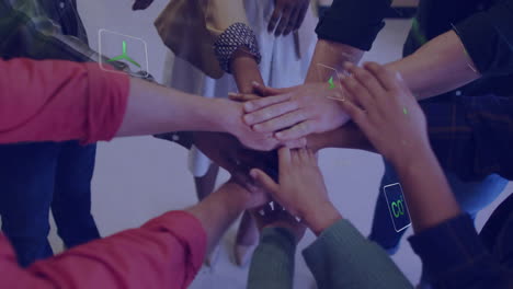 In school, diverse group joining hands with animation overlay for teamwork