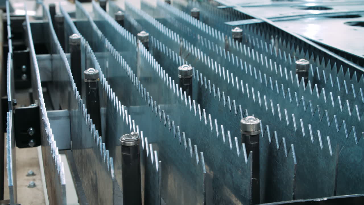 Craftsman industrial experienced operator technician worker Skilled machinist working intently on a large industry in metal factory workshop with Large Machines