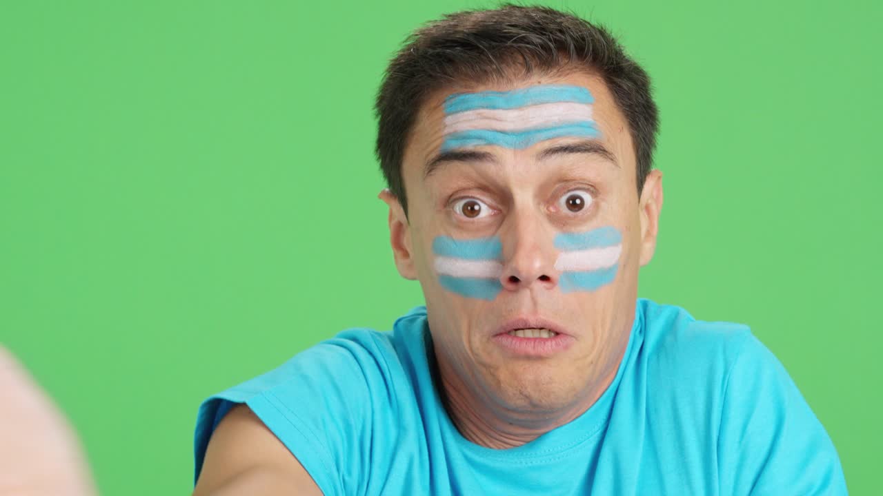 Man with argentine national flag upset with a referee