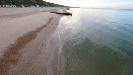 Aerial-Drone-Footage-along-Boscombe-Beach,-Bournemouth,-Dorset