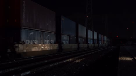 freight train passing by at night