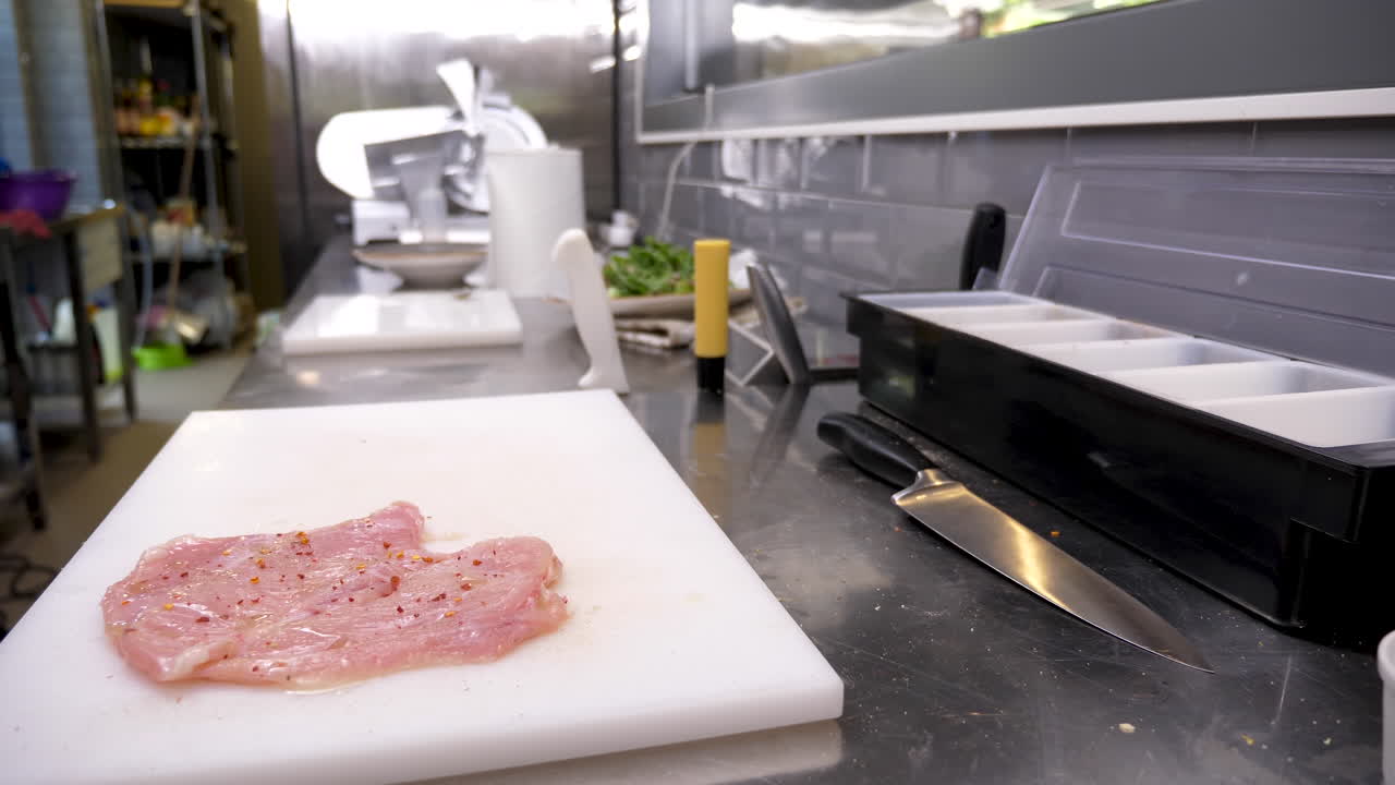 Preparing chicken in the kitchen