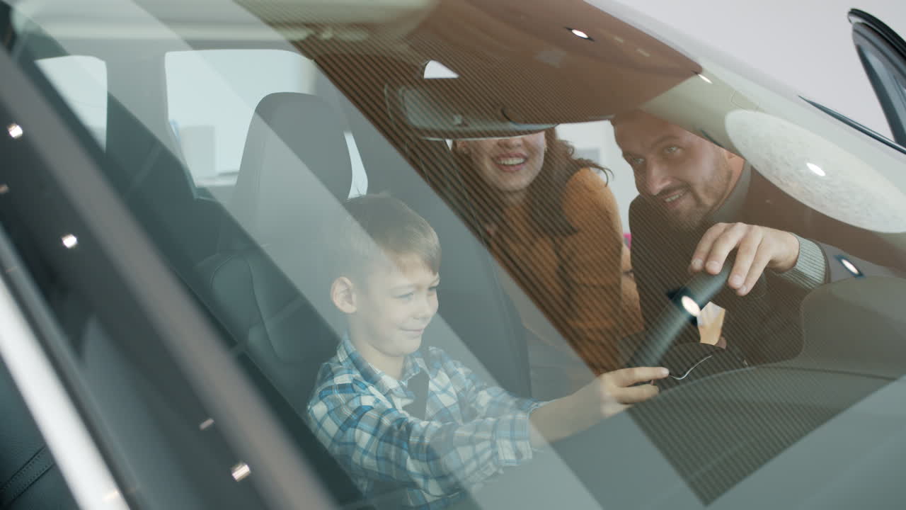 Family Test Driving a New Car