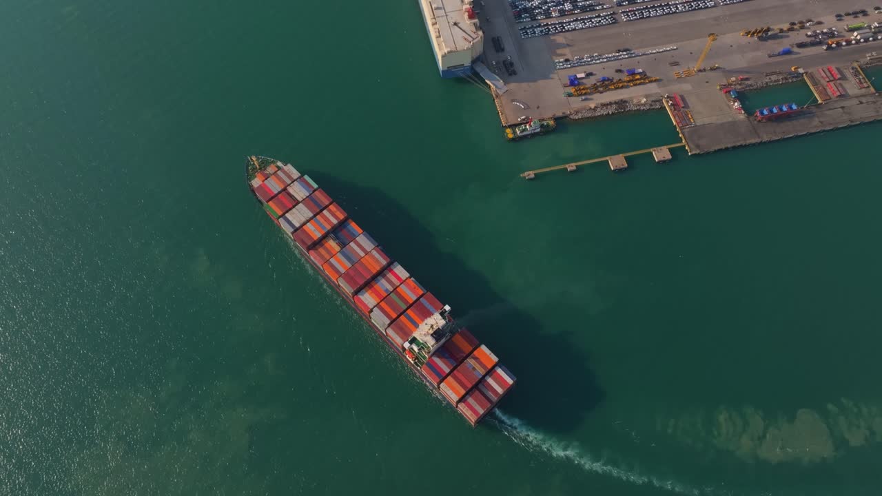 Drone view of cargo ship sailing ocean for global trade, Thailand