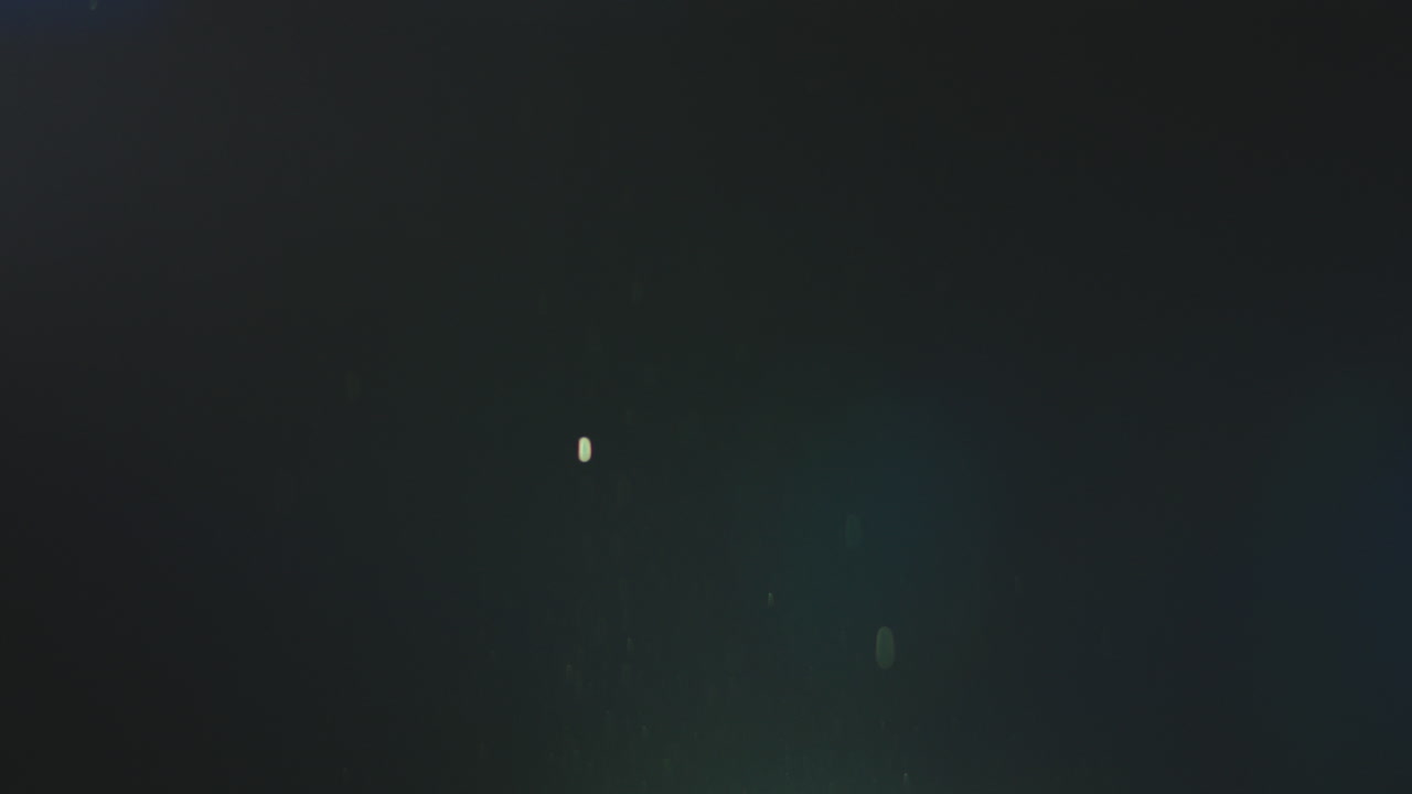 어두운 입자와 함께 추상적인 배경