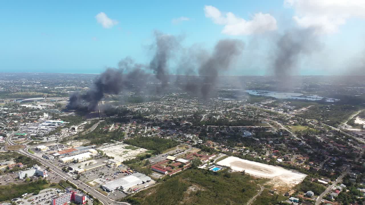 Nassau, Bahamas. Drone Aerial View of Fire and Dark Smoke Above City