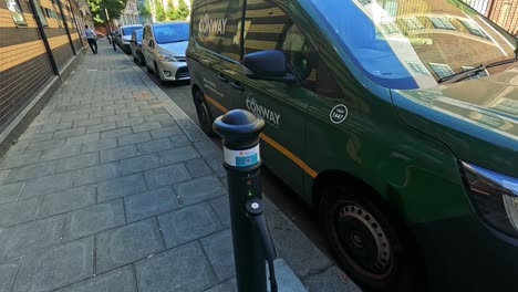 van charging at street station in london