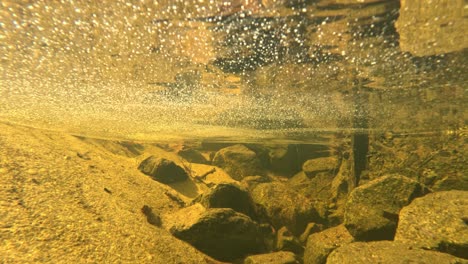 dirty water flows through an underwater drain