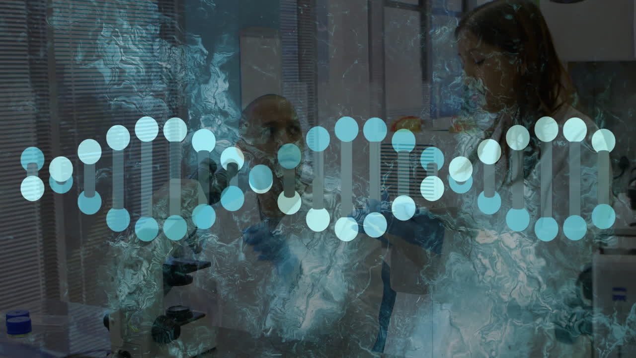 In laboratory, scientists working with DNA strand animation displayed on screen