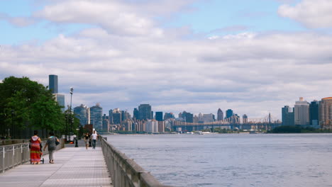 new york city skyline from the east river walkway