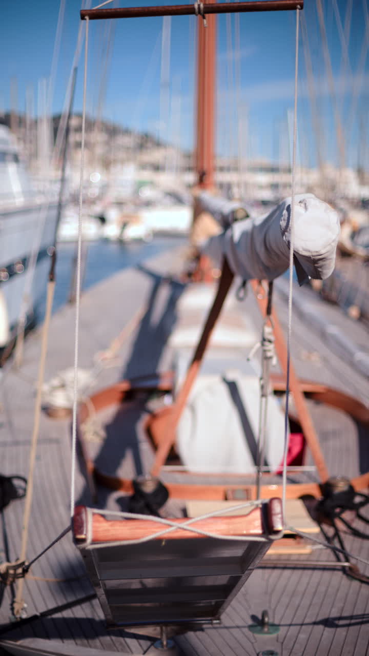 Close up of the top of a boat docked in a harbour. Vertical
