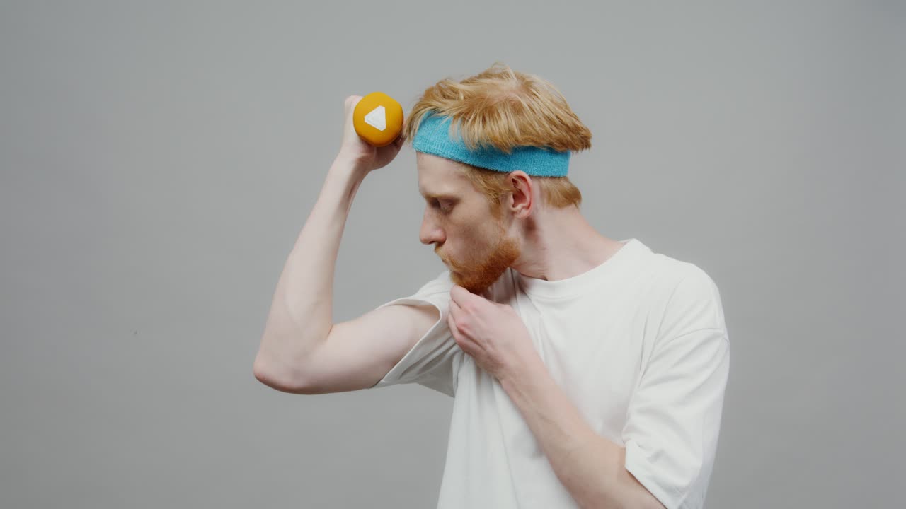 Man Lifting Dumbbell