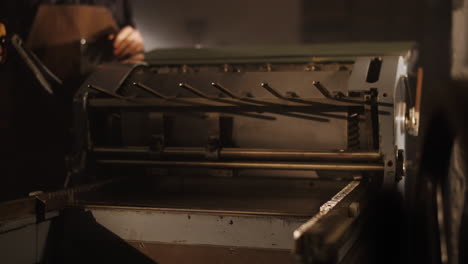 vintage printing press in operation