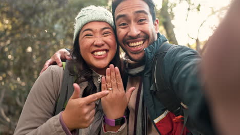 engagement, selfie and couple with ring on hand