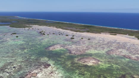 The-pristine-south-barrier-wetland-in-los-roques,-venezuela,-with-vibrant-coral-reefs,-aerial-view