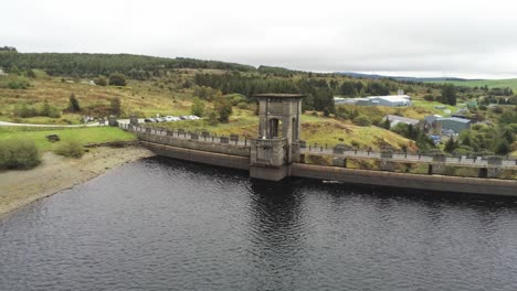 alwen reservoir industrial hydroelectric landmark historical rural lake dam building slow aerial orbit left