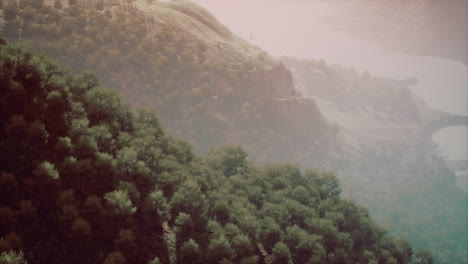scenic countryside landscape with green summer mountain valley and forests