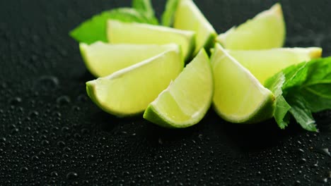 lime segments with mint leaves