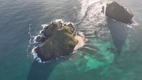 aerial-drone-view-of-Mokolua-Islands-in-kailua-lanikai-hawaii-at-sunrise