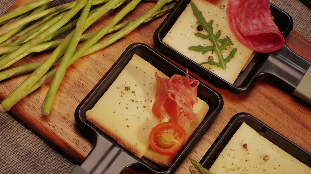 Italian or Spanish restaurant with traditional tapas food, Spanish cuisine, delicious tapas and cheese plate, bruschetta with cheese, olives dry tomatoes and tasty sandwich bar appetizer, buffet