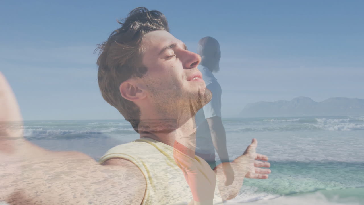 two blended figures opening arms on beach shore, featuring health campaign with ocean wave overlay