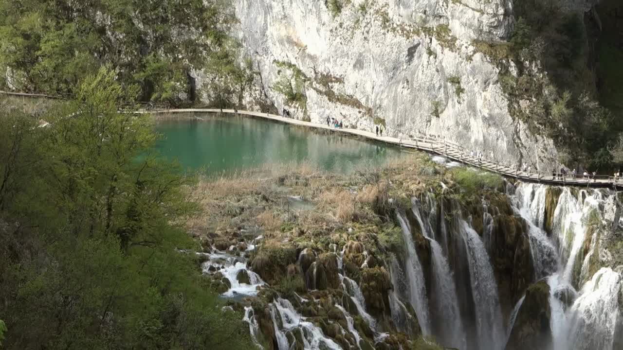 cascades and wooden platform in Plitvice Lakes National Park. Croatia