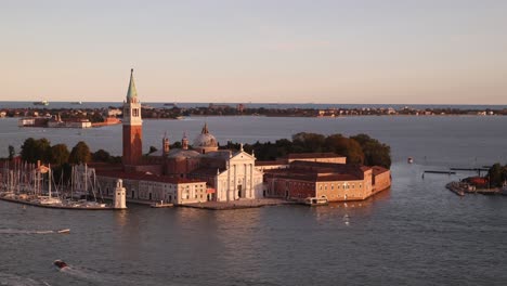 aerial view of san giorgio maggiore island in venice, italy at sunset