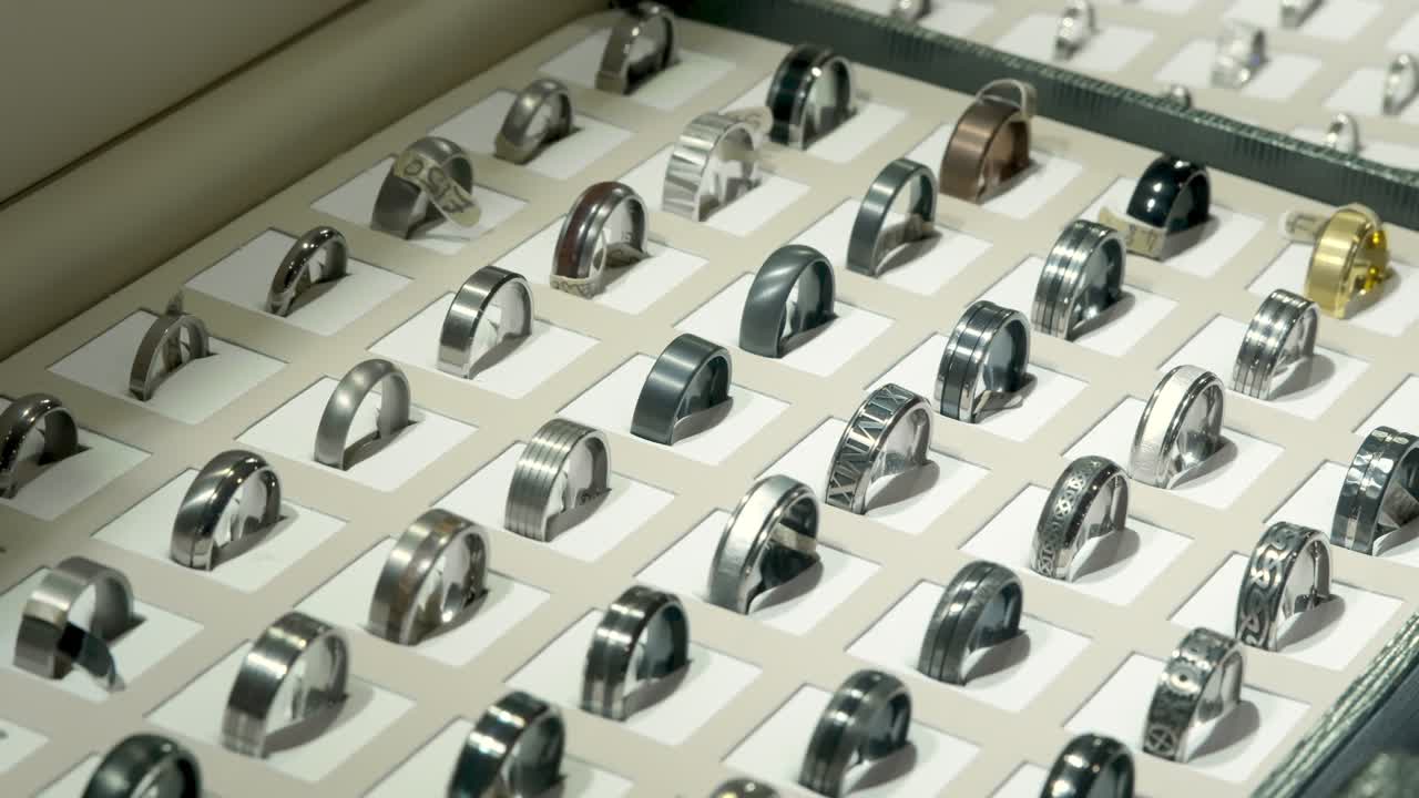 Gold, Silver, Copper Wedding Rings On Display At High End Jewellery Shop.