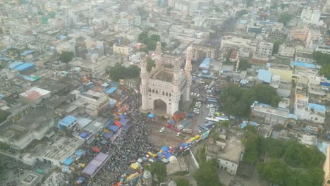 aerial view of charminar in hyderabad, india with a large crowd