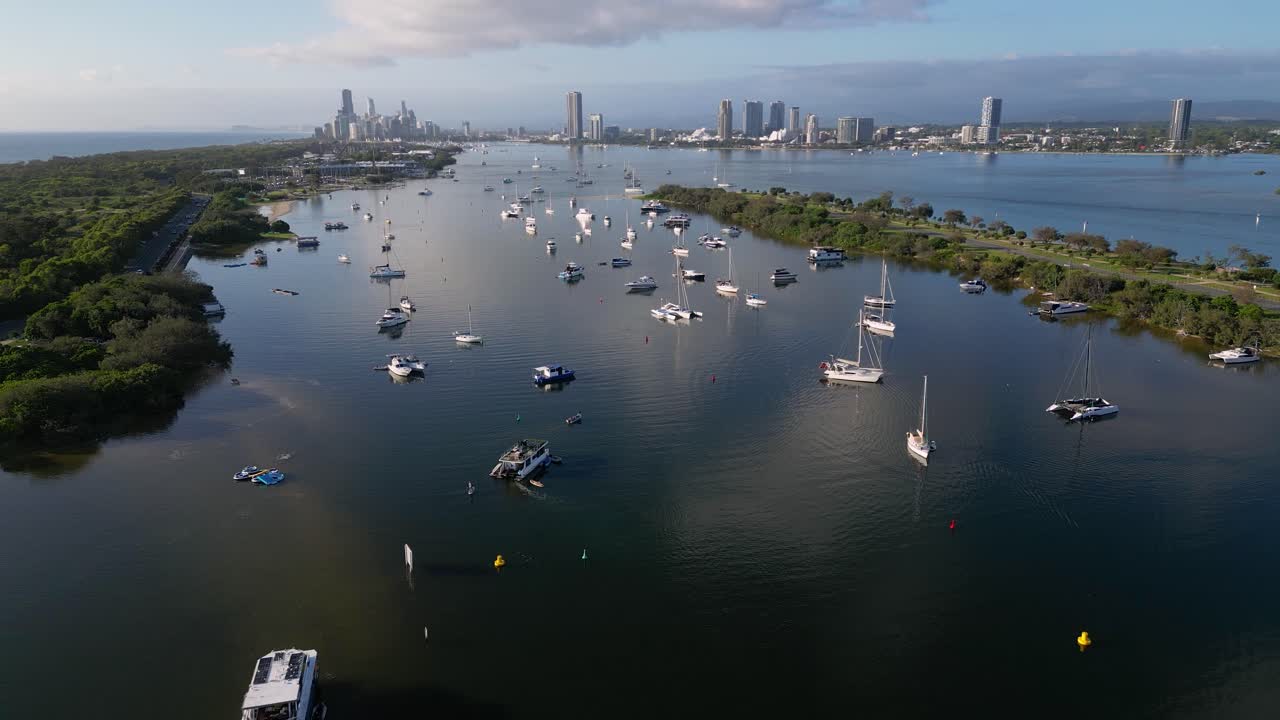 Left to right aerial view over Doug Jennings Park looking South towards Surfers Paradise, Gold Coast, Australia.