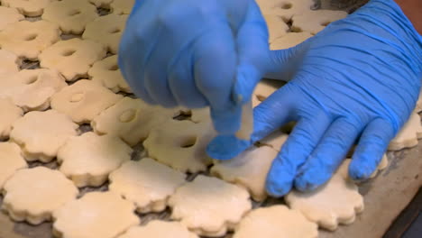 preparing the raw puff pastry for the oven