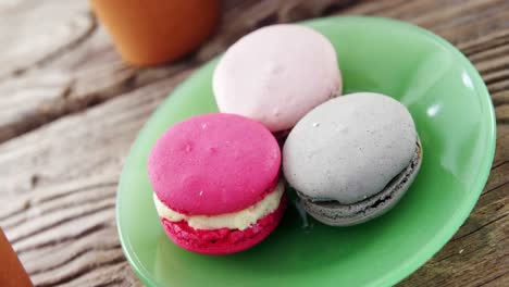 colorful macaroon cookies in plate