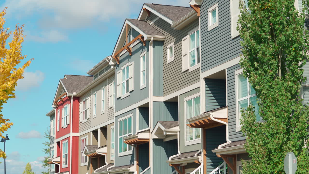 Still shot of condominium building during bright and sunny midday in Alberta