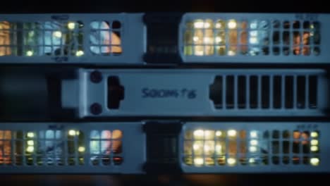 a close-up view of high-tech server hardware with illuminated components, showcasing server cooling and data processing technologies in an it environment