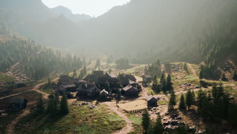 old wooden village on the rocky mountain background