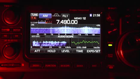 listening to and changing frequency of shortwave or amateur radio ham