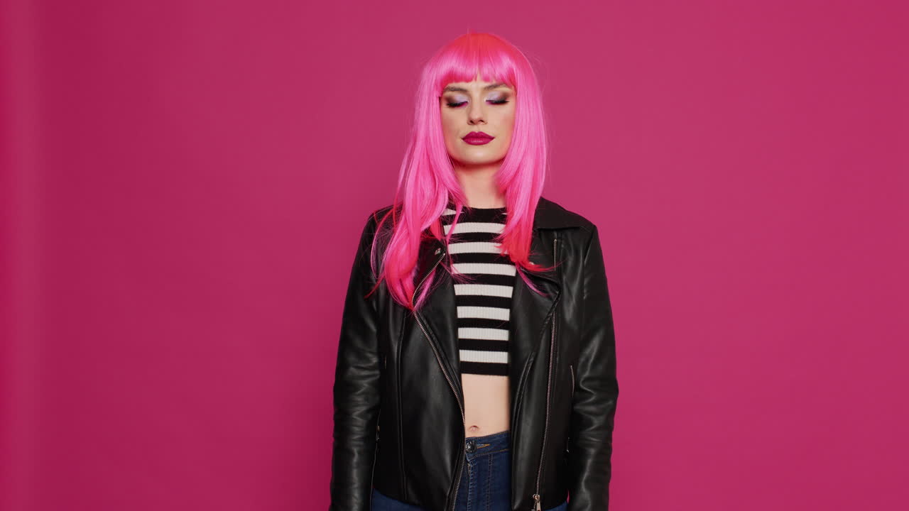 Confident joyful model feeling zen and meditating in studio